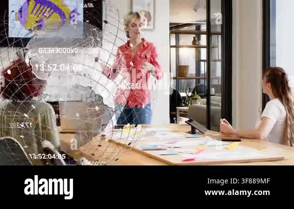 Presenter pointing to monitor and initiating augmented globe overlay ...