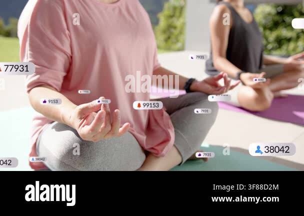 Two women meditating on patio, badges appearing, growing, obscuring ...