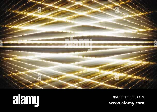 Dynamic abstract animation of glowing yellow lines creating a ...