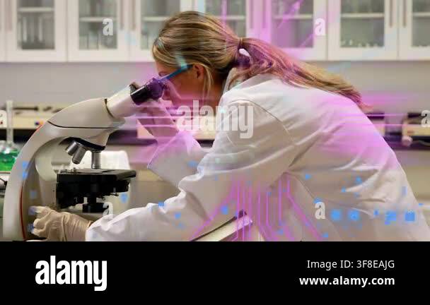 Lab researcher leaning and adjusting microscope focus, creating ...