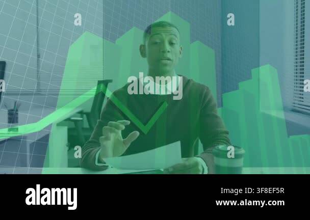 Man reading docs, lifting page to camera, starting green finance chart ...