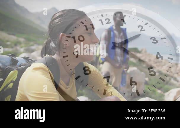 Clock hands starting moving, seated woman smiling, man adjusting bottle ...