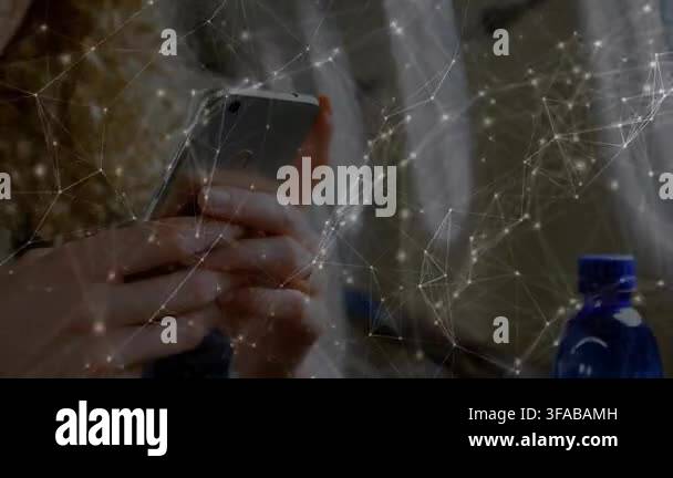Woman holding smartphone and tapping screen, activating network node ...