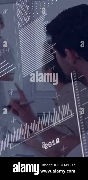 Vertical video: Seated man writing while speaker speaking, charts ...