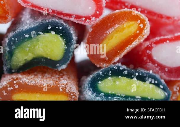 different-types-of-candy-are-stacked-together-showing-bright-colors