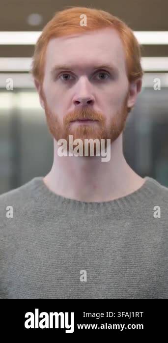Portrait of Young Man Showing Stop Sign by Hand, Vertical Video Stock ...