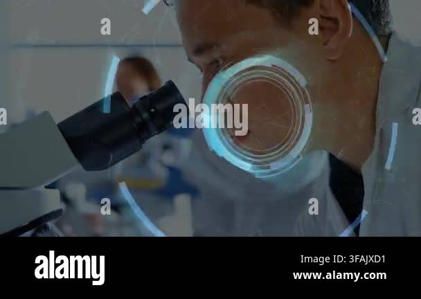 Lab tech leaning into scope starting HUD rings and binary aligning with ...