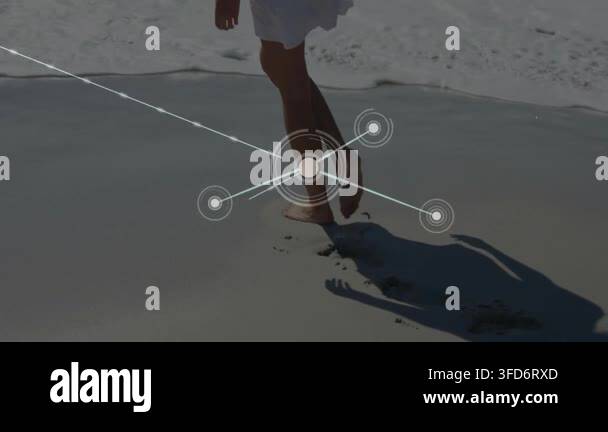 network-of-connections-animation-over-person-walking-on-sandy-beach