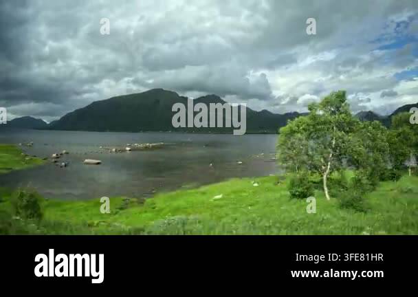 smooth-driving-pan-past-a-rocky-shoreline-near-bleik-andoya-northern