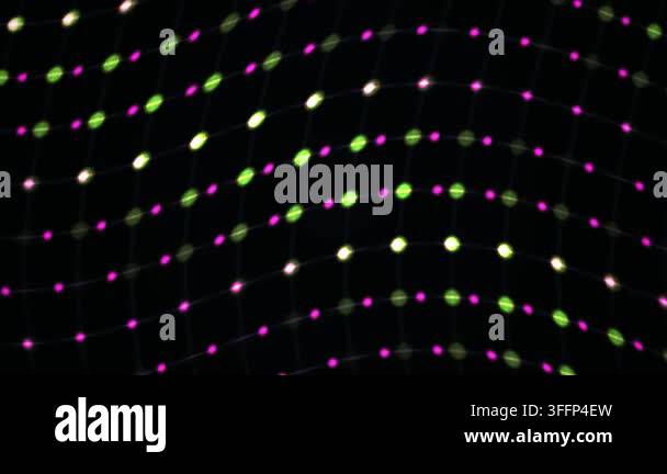 Glowing grid of vibrant neon dots moves dynamically in a wave pattern ...