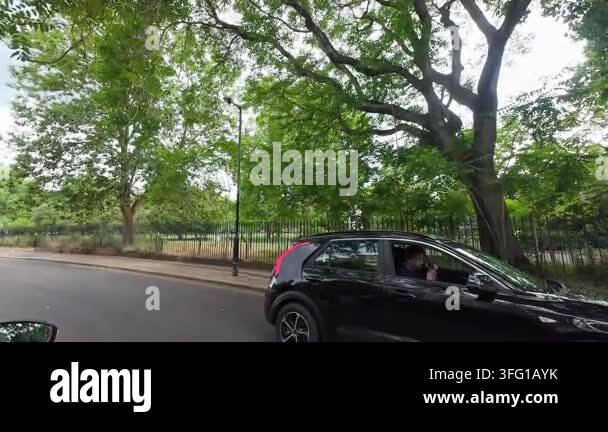 car-drive-on-english-city-streets-and-roads-of-england-great-britain