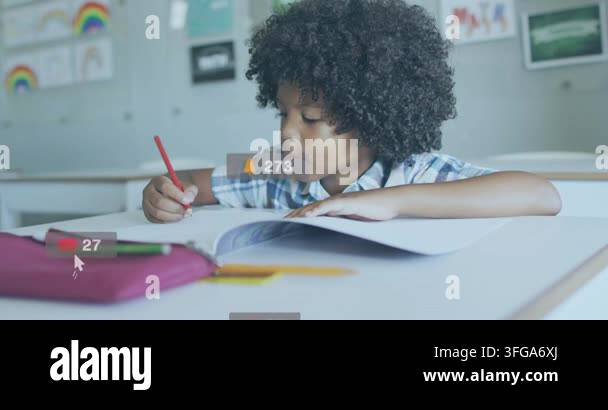 Student writing with red pencil at desk, incoming notifications ...