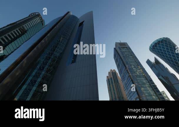 Cladding In Construction Multiple high-rise buildings combine rounded glass forms, pointed roofs ...