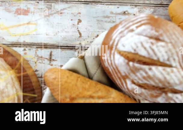 On teal blobs appearing, overlays sweeping across artisanal bread, view ...