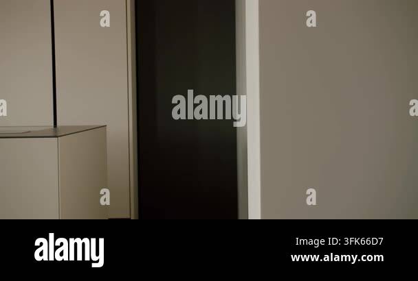 Neutral Color Abstracts A minimalist interior scene featuring an abstract play of shadows and ...