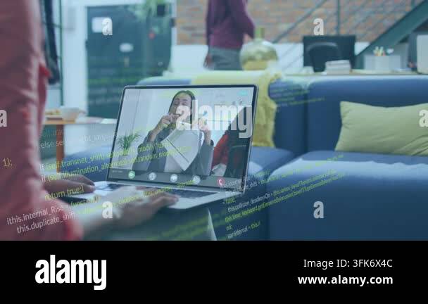 Laptop user typing on sofa in remote meeting presenter raising paper ...