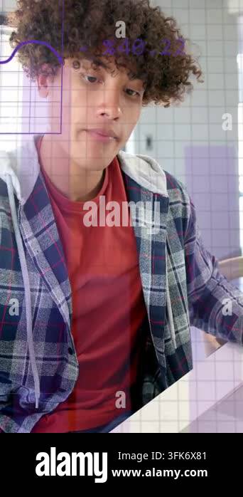 Technical Data Visualization Vertical video: Man placing mug, tapping laptop and starting purple AR ...