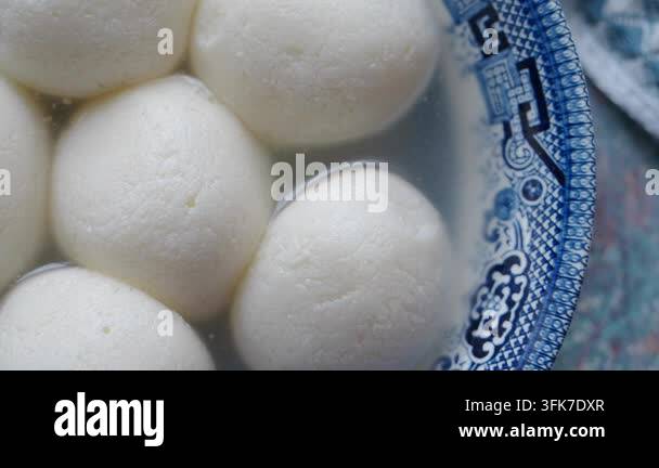 Rasgulla Sweets in a Decorative Blue and White Bowl Stock Video Footage ...