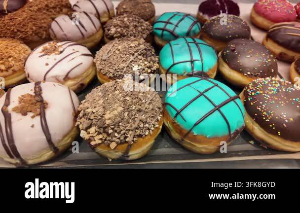 Html Box Display Type People look at different types of donuts in a bakery Stock Video ...