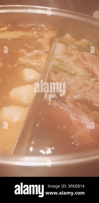 Cook'd Rice cooking hot pot with chicken and hot rice in a hot pot Stock Video ...
