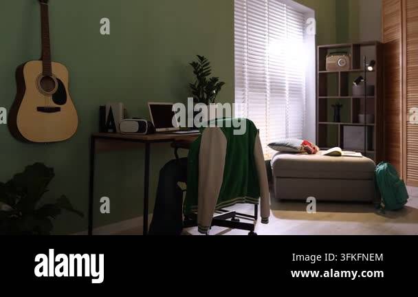Video Camera Design Stylish teenager's room with furniture, decor and guitar, camera moving ...