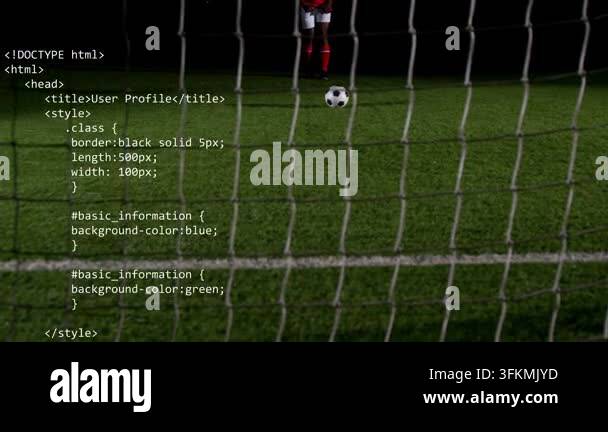 Male soccer player stepping to ball striking sending ball into net ...