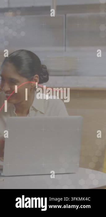 Technical Data Visualization Vertical video: Woman reacting right, analyzing tech data on laptop ...