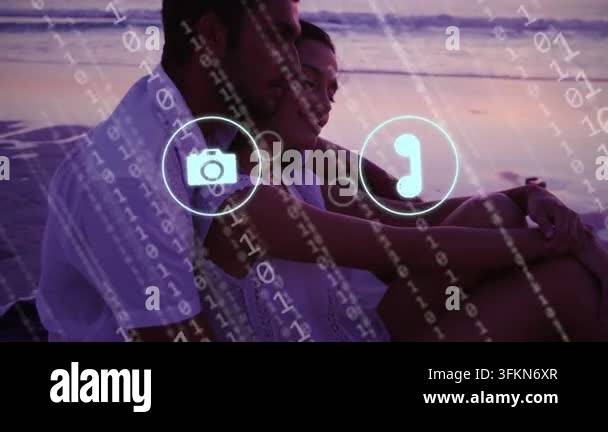 Couple leaning on beach binary stream causing overlaying app icons then ...