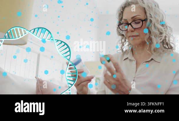 Senior woman picking bottles on couch, comparing labels to check dose ...