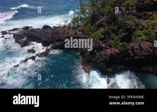 Lava Racks Aerial view of Kaihalulu Beach on Maui Hawaii island with white waves ...
