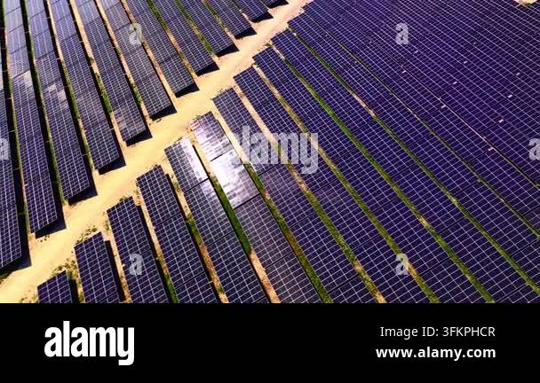 Overhead view of solar panel rows and access paths. Drone top down ...