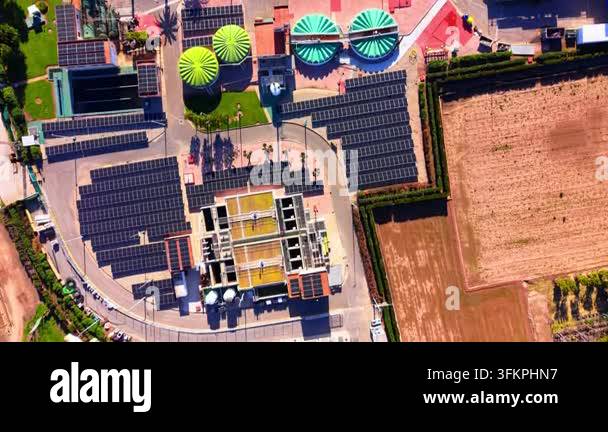 Solar panel array at a water treatment facility, Spain. Rows of ...