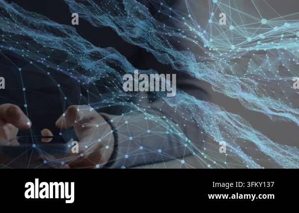 Man tapping smartphone on couch, thumb tapping initiating blue network ...