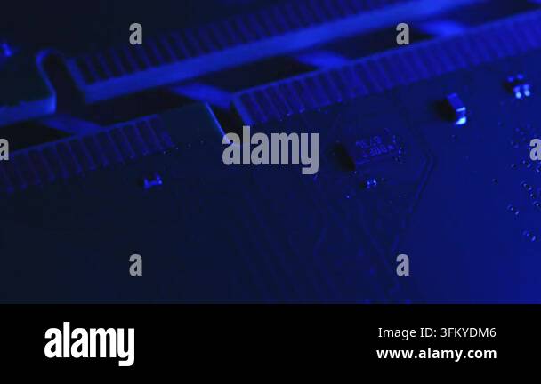 Extreme macro footage of two DDR4 RAM modules, showing gold contacts ...