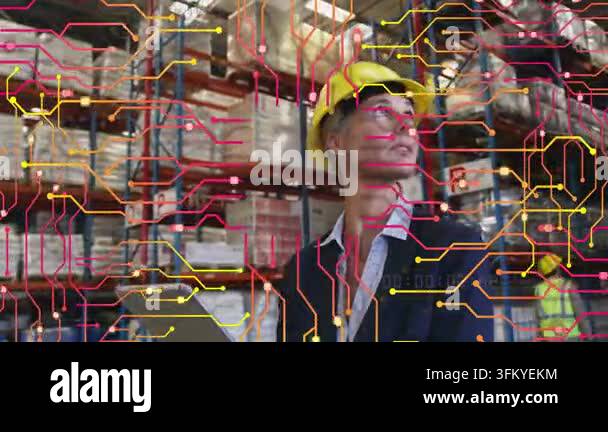 Warehouse lead yellow hat scanning racks tapping tablet checking stock ...