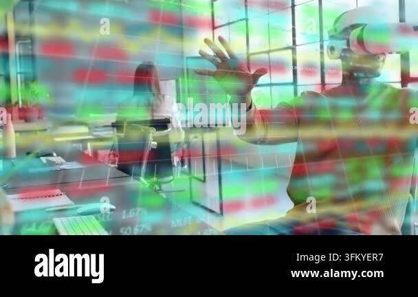 Technical Data Visualization Man with VR headset raising hands and manipulating overlay charts in ...