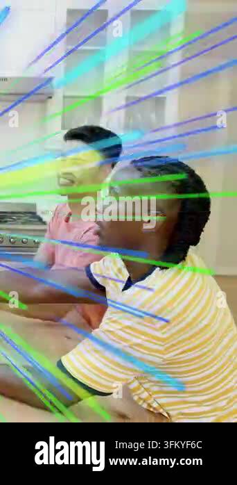 Vertical video: Two men sitting and reacting to moving color streak ...