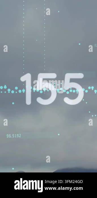 Animation of changing numbers and data processing against grey sky ...