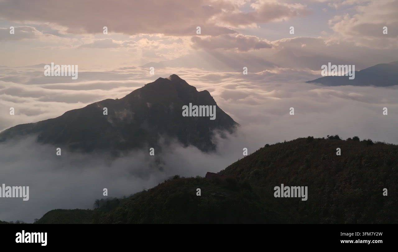 Sunrise Over High Mountain Peak Above Sea of Clouds in Vietnam Stock ...