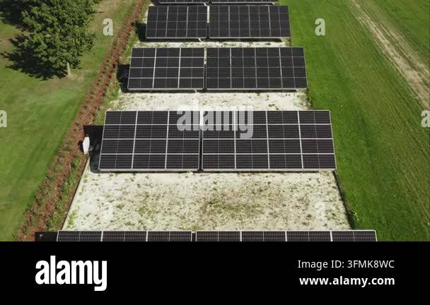 Ground mounted solar panel array generates clean energy on a farm ...