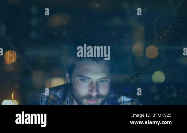 Animation of scientific data over happy caucasian man using laptop ...
