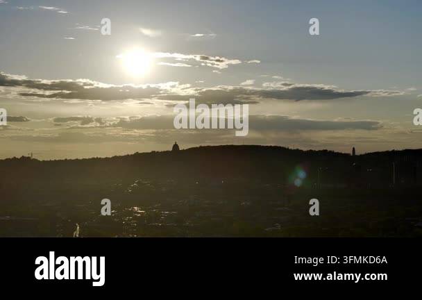 sunset over the city Stock Video Footage - Alamy