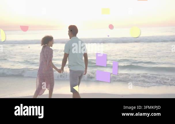 Couple holding hands walking sunset shore, pastel shapes appearing ...