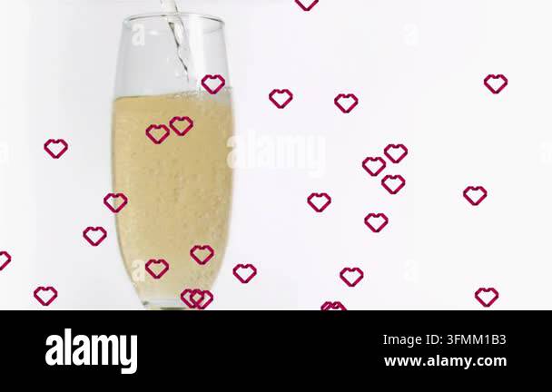 Off-frame stream pouring into flute raising level bubbling filling with ...