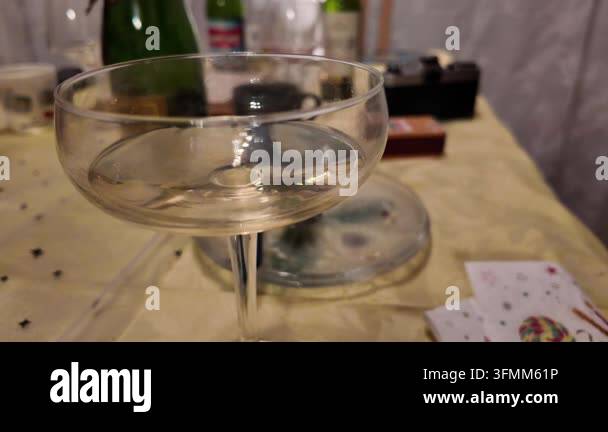 Person drinking champagne at family birthday meal -- Guest drinking ...