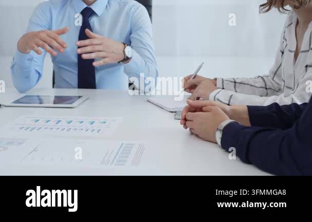 Business team analyzing financial data using charts, graphs, and ...