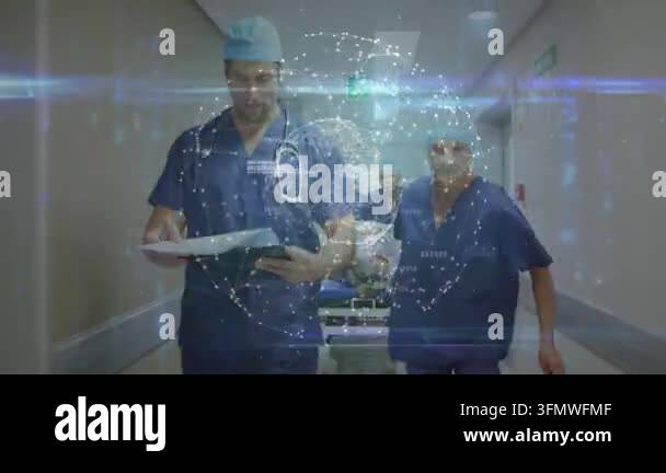 Animation of digital data interface over two diverse doctors. global ...