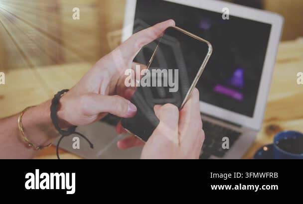 Animation of media icons over caucasian businessman using computer ...