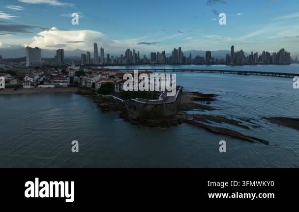 Aerial view of historic buildings on a peninsula with modern ...