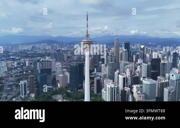 aerial-orbit-view-of-kuala-lumpur-city-skyline-with-menara-kl-and-other